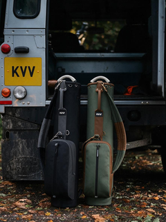 Sturdy handle and strap detail on classic 2-pocket PU leather golf bag