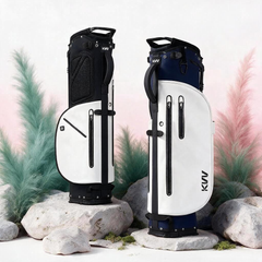 Vintage style 5-way golf stand bag on driving range with clubs organized